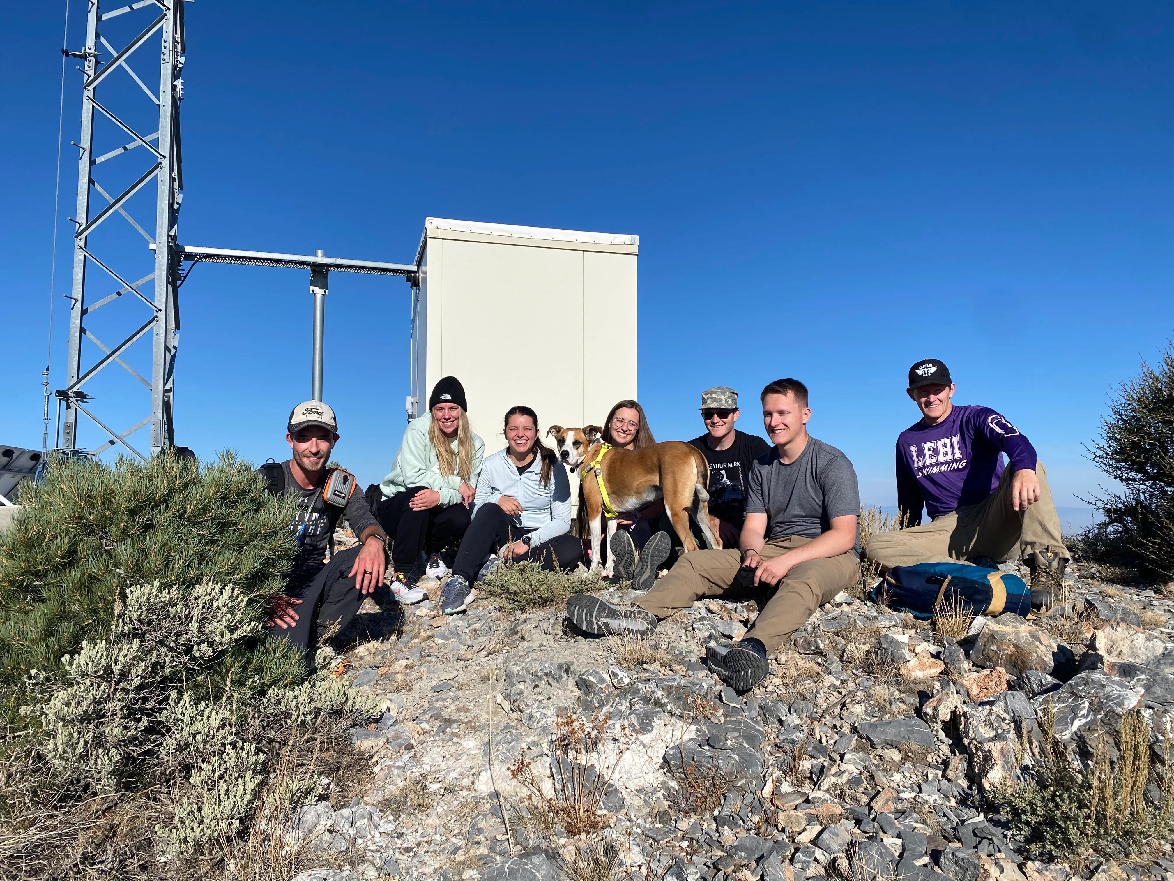 picture of our group at the summit of a mountain